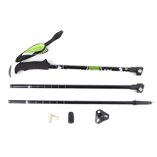 Pair of foldable trekking poles with black shafts, green strap accents, and parts