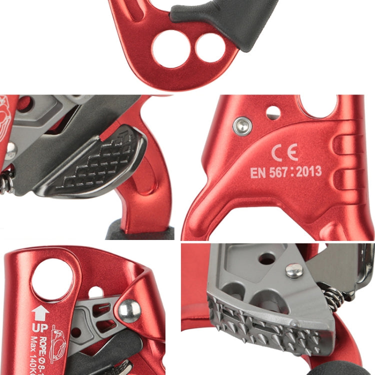 Handheld left-hand rope gripper close-up: orange body, black cam, and treaded contact pad.