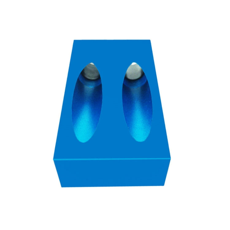 Blue hole locator block with two angled openings for wood dowel alignment