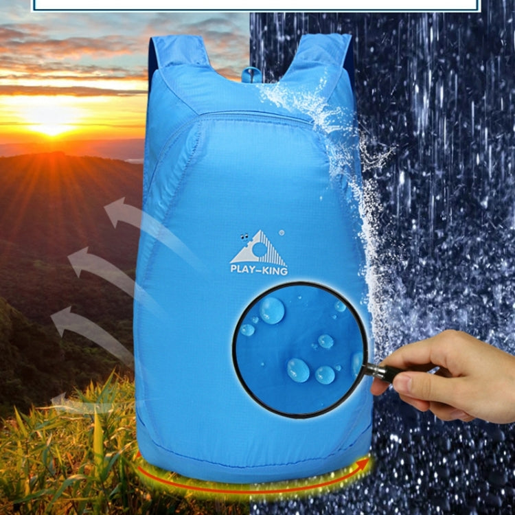 Blue foldable anti-splash outdoor backpack with water-splash effect on front