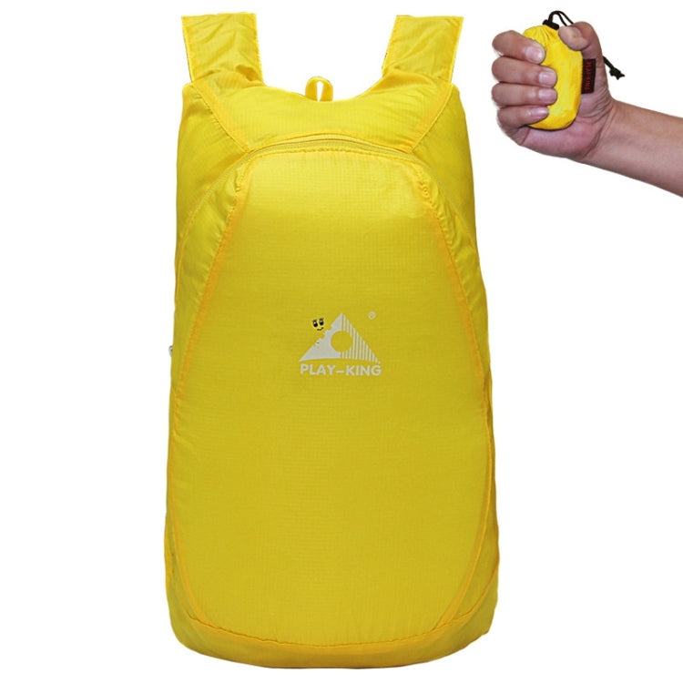 Foldable anti-splash backpack, yellow with top carry loop and PLAY-KING logo.