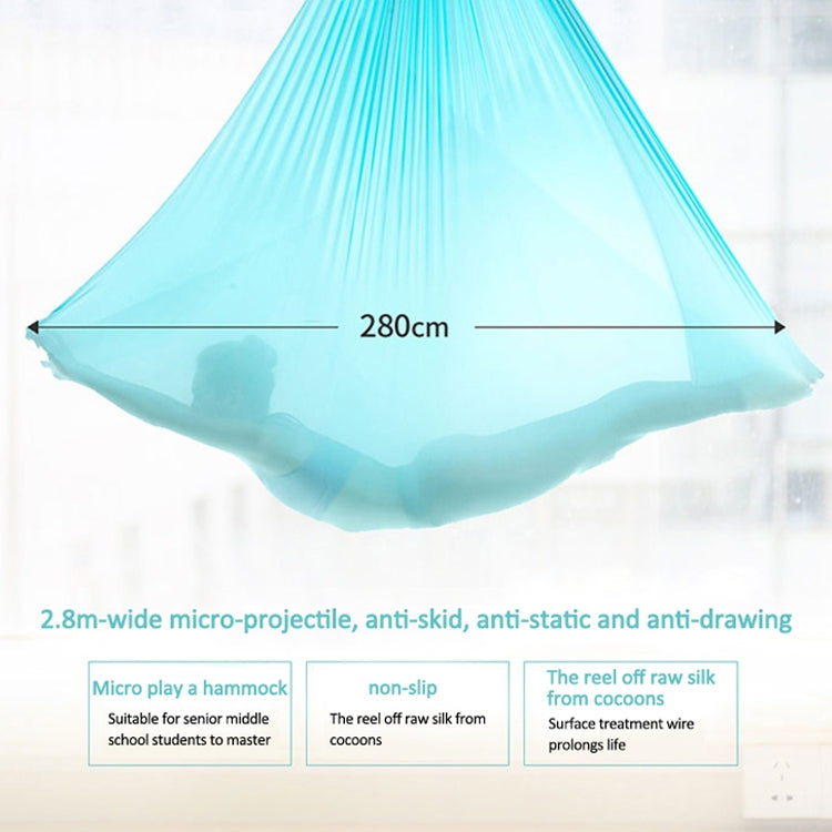 Light blue aerial yoga hammock fabric stretched wide, underside view