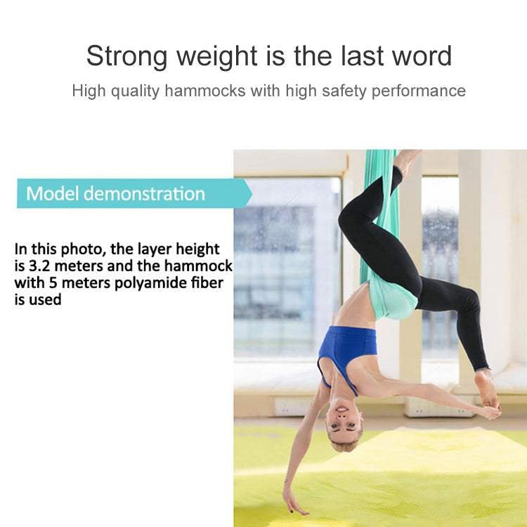 Light blue aerial yoga hammock set, person in supported headstand inside hammock