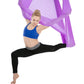 Purple aerial yoga hammock with mesh fabric, person stretching legs