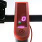 Red waterproof silicone LED sleeve showing a purple digital display