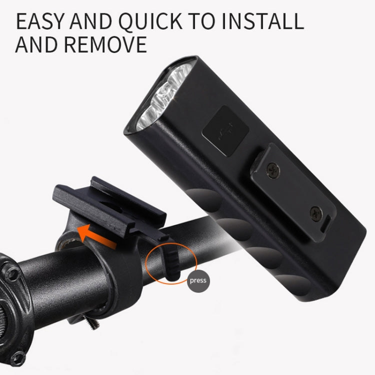 Bicycle front light with mounting clip and side button switch, close-up