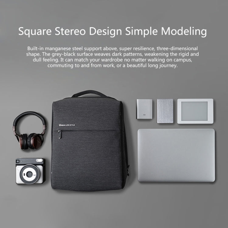 Dark gray laptop backpack with top handle, front zip pocket, and shoulder straps