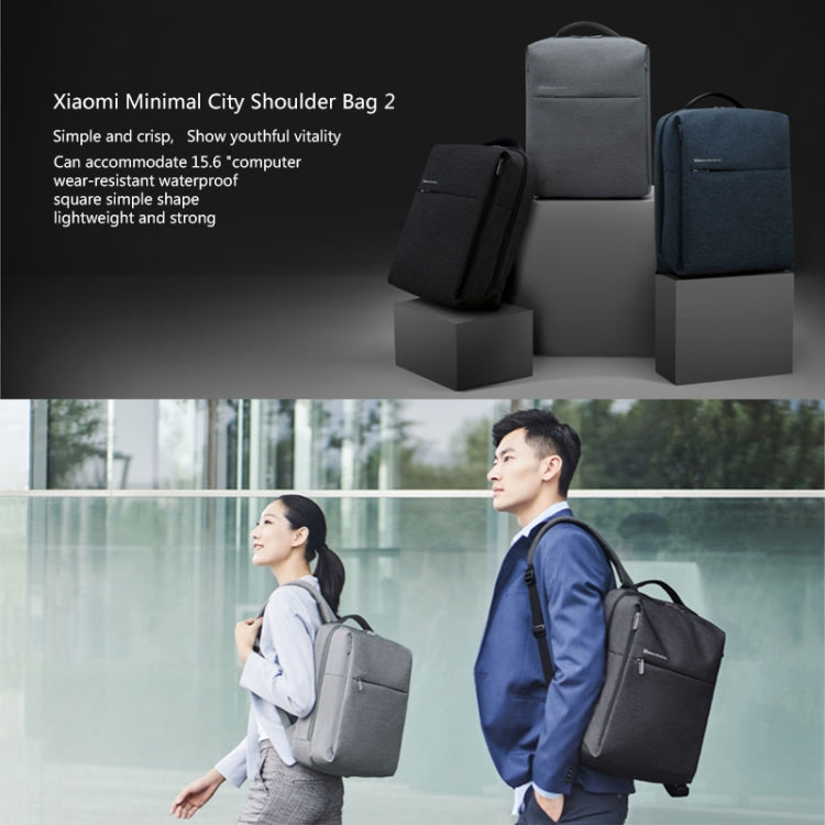 Laptop backpack shown in dark and light gray colors with zip front