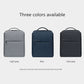 Waterproof simple backpack shown in three colors, with top handle and front zip pocket