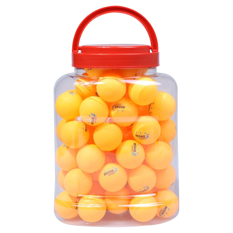 Clear jar filled with yellow table tennis training balls, red lid with handle