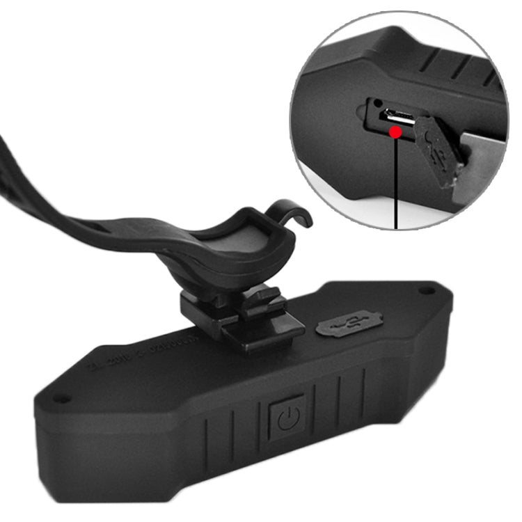 Black bike tail light mount with power switch and connection port, close-up view
