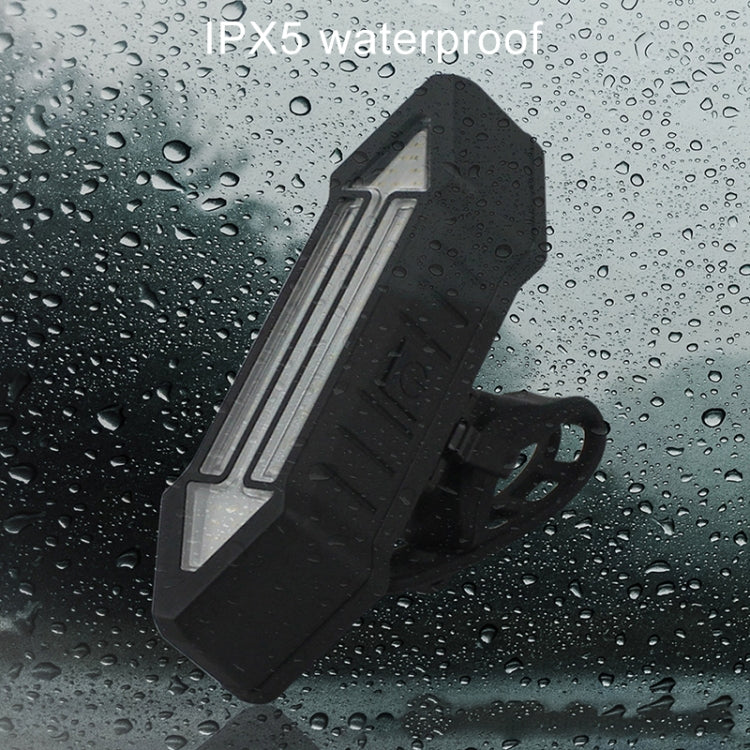 Waterproof bike tail light with clear LED strip and black textured housing