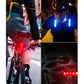 Bicycle rear LED taillight with red light glowing on a bike frame