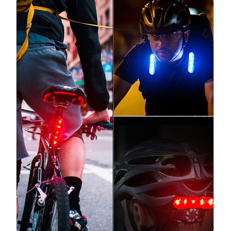 Bicycle rear LED taillight with red light glowing on a bike frame