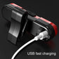 USB charging port on black housing bicycle taillight with white charging cable