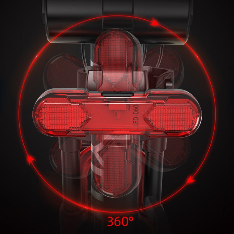 Red LED bicycle taillight showing 360-degree light pattern effect