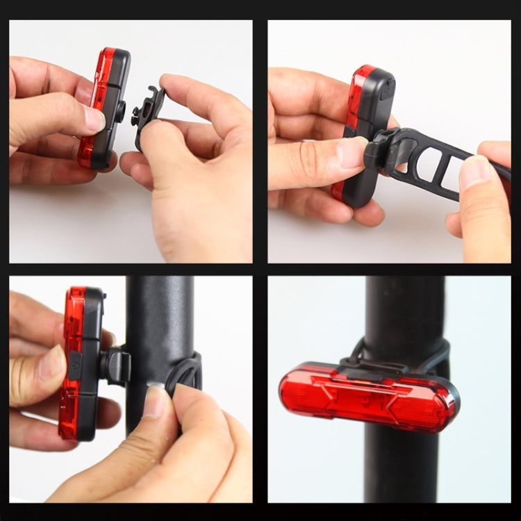Red LED bicycle taillight being installed with strap on a handlebar or seatpost