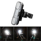 White LED bicycle taillight close-up showing bright output with textured lens