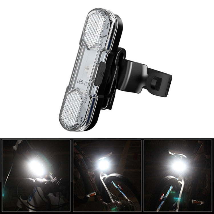 White LED bicycle taillight close-up showing bright output with textured lens