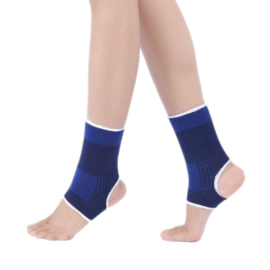 Royal blue elastic ankle support guards with white trim, on both feet