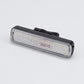 Bike tail light with vertical multicolor LED strip, mounted on bike.
