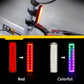 Bike tail light mounted on handlebar, glowing red-orange or colorful mode.