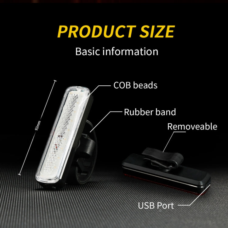 Bike tail light with clear lens, removable strap mount, and USB port.