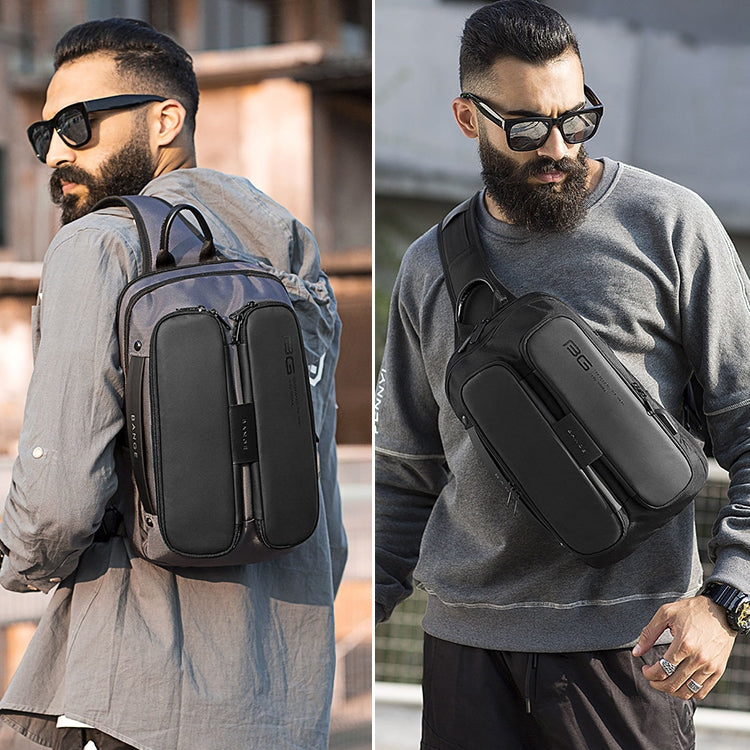 Black chest bag worn crossbody with adjustable strap and front pockets