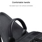 Black textured chest bag with comfortable rounded top handle and smooth zipper edge