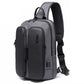 Black and grey chest bag with front organizer panel and side zippers
