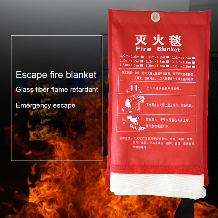 Red fire blanket with white bottom panel and printed safety label