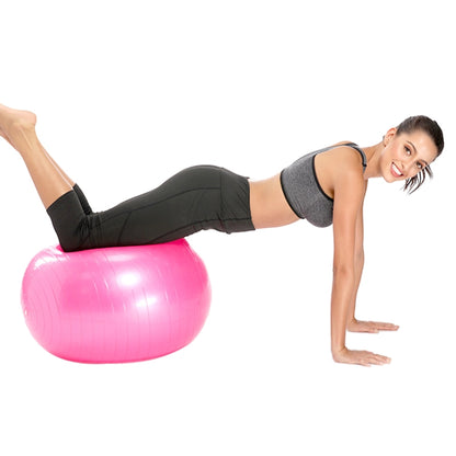 Pink anti-burst fitness yoga ball, textured grip surface, used for balance exercises