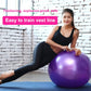 Purple anti-burst fitness yoga ball used for seated stretching