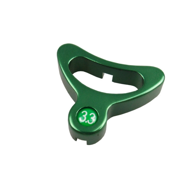 Green bicycle spoke wrench tool marked 3.3 for wheel spoke nipples
