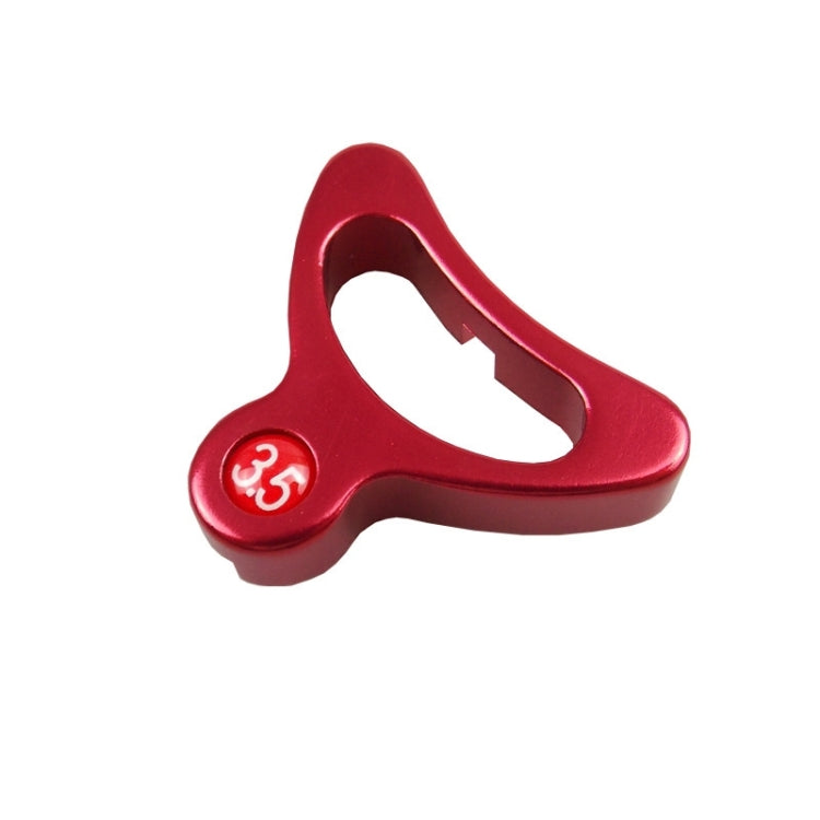 Red bicycle spoke wrench tool with oval handle and marked 3.5 size