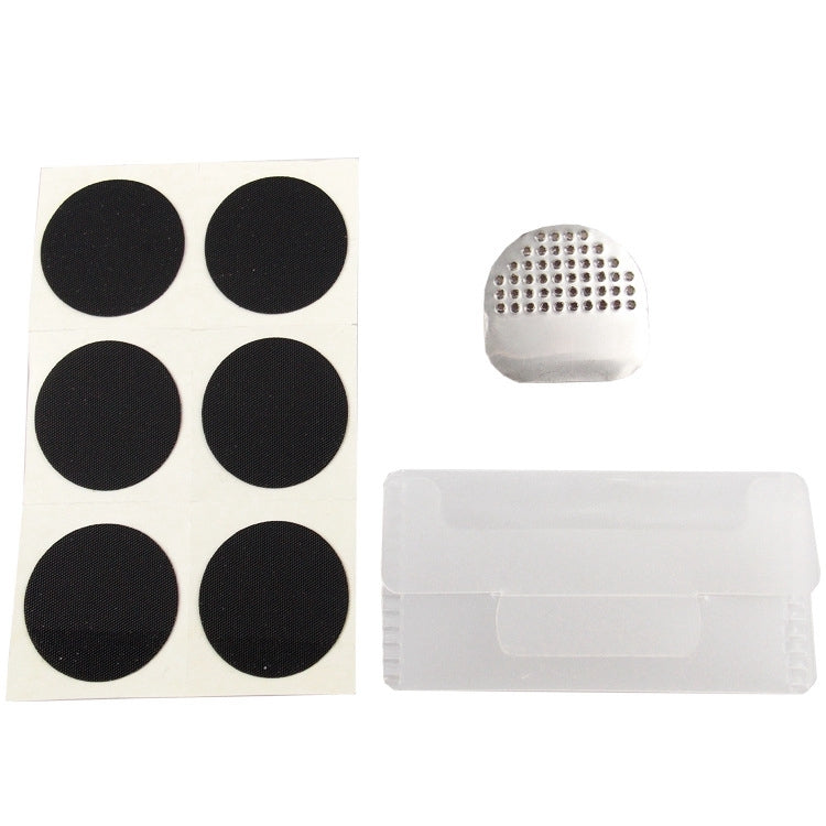 Bicycle inner tube patch kit with dark round patches, gray patch, and plastic storage