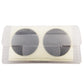 Glue-free bicycle tire patch pair, two dark circular patches inside clear plastic
