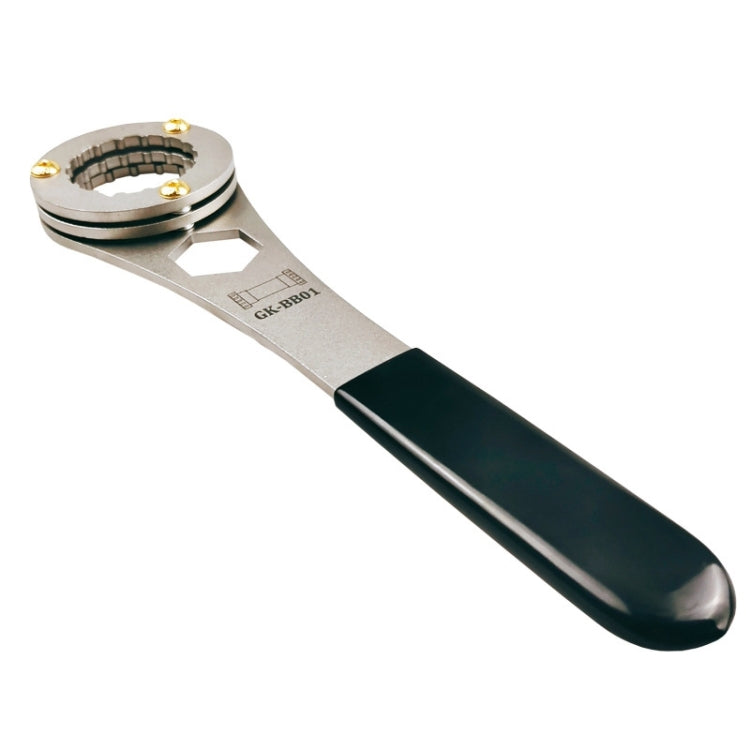 Bike bottom bracket wrench tool with toothed ring and long black grip