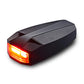 Black bike tail light with glowing amber-red light bar on rear housing