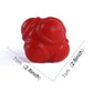 Red hexagonal reaction training ball close-up with size markings (7 cm / 2.8 in)