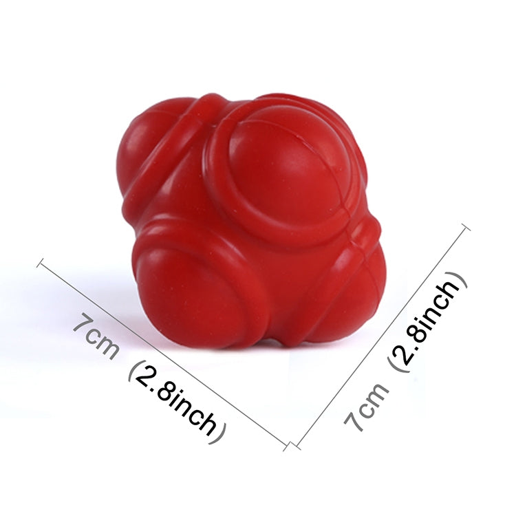 Red hexagonal reaction training ball close-up with size markings (7 cm / 2.8 in)