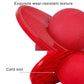 Red inflatable balance jumping ball with textured surface and pedal-style base