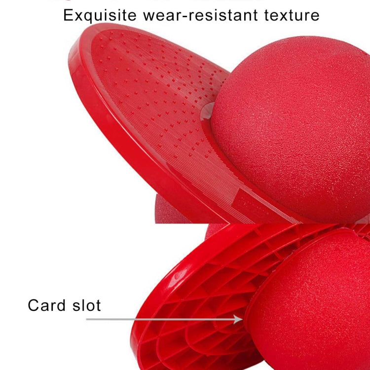Red inflatable balance jumping ball with textured surface and pedal-style base