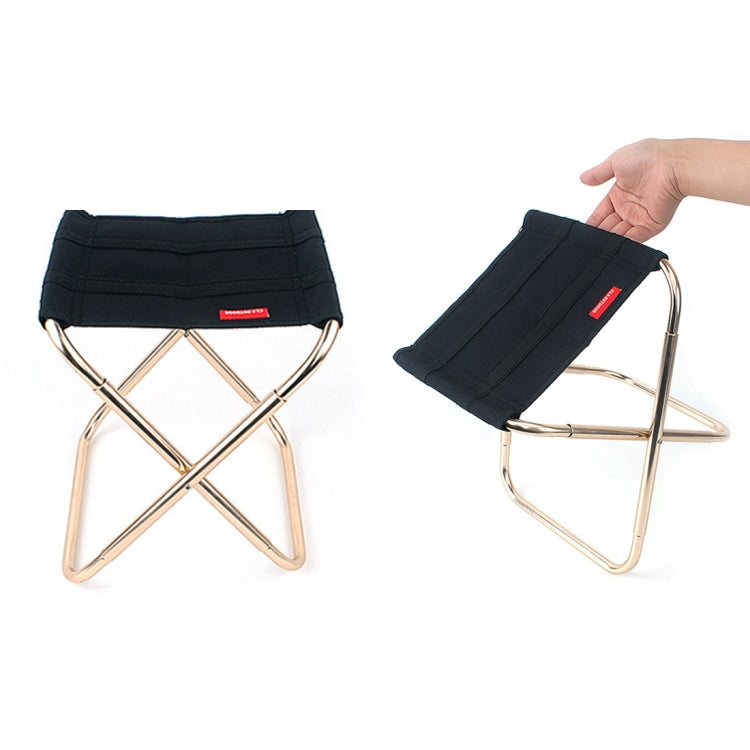 Black padded folding stool with cross-braced aluminum legs and curved armrests