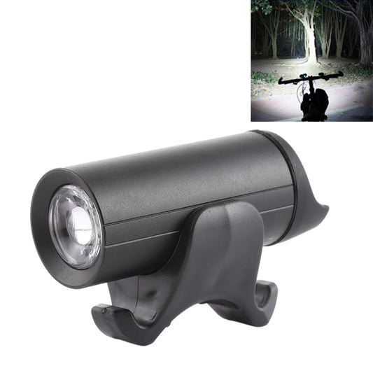Black bicycle front lamp with wide beam LED and handlebar mounting clip