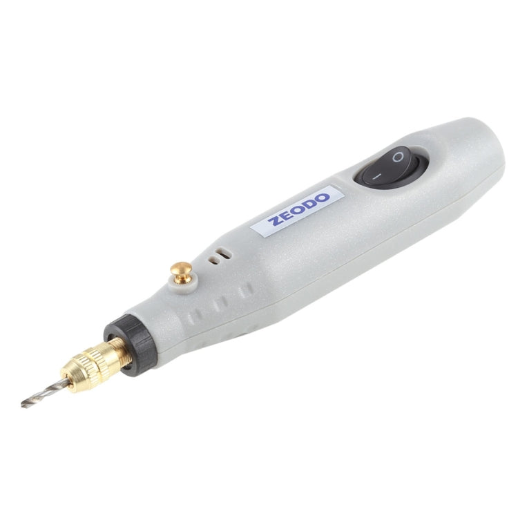Mini electric grinder drill with tool bit, light gray body and control switch