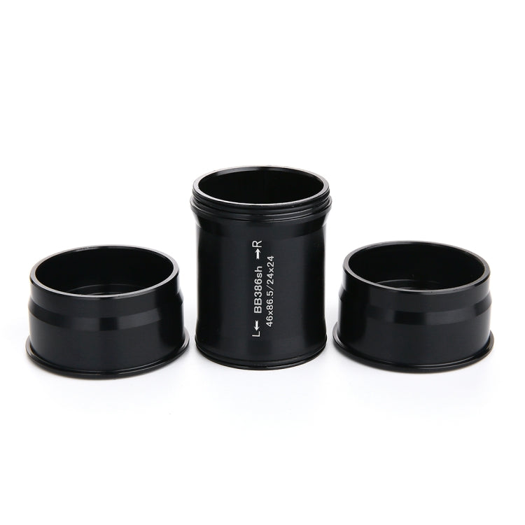 Set of three black press-fit bottom bracket cups with L and R side markings