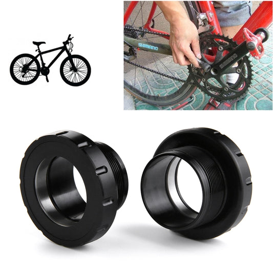Pair of black press-fit bottom bracket cups with threaded bore and small mounting tabs