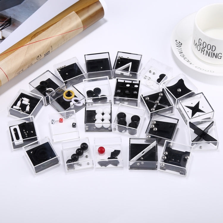Reducer toy set boxes display, multiple clear cubes with black, white, and red parts