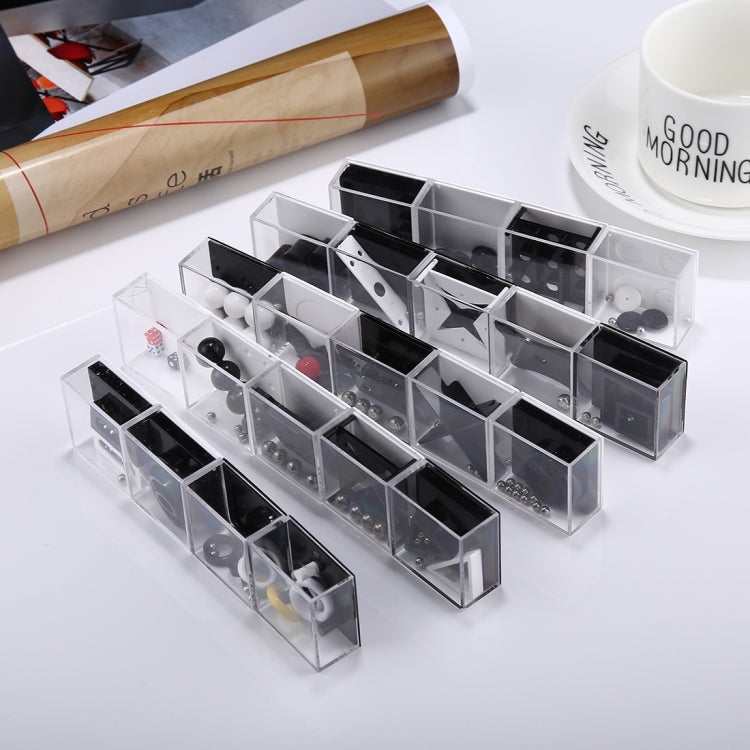 Clear reducer toy set boxes arranged in rows with black interior balance pieces